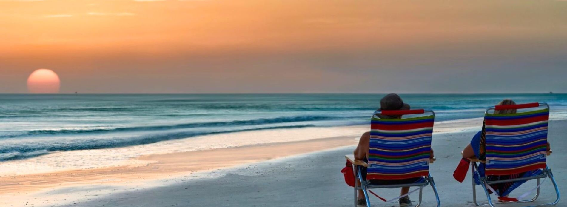 couple on beach at sunset
