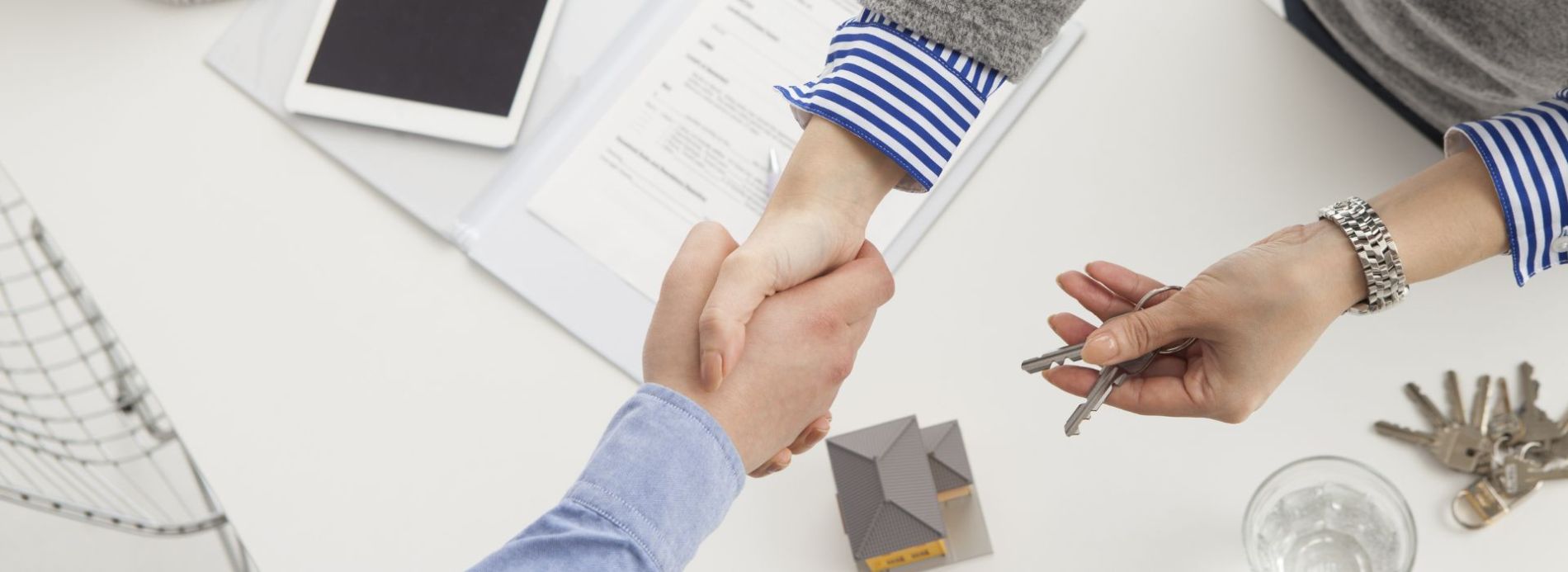 selling a house and shaking hands